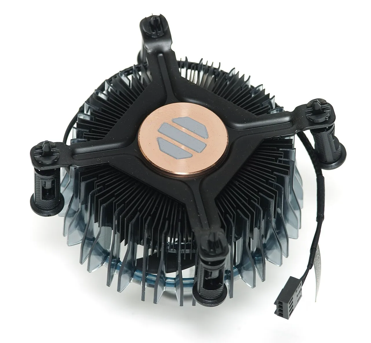 Underside of a computer CPU cooler showing the copper contact base with grey pre-applied thermal interface material